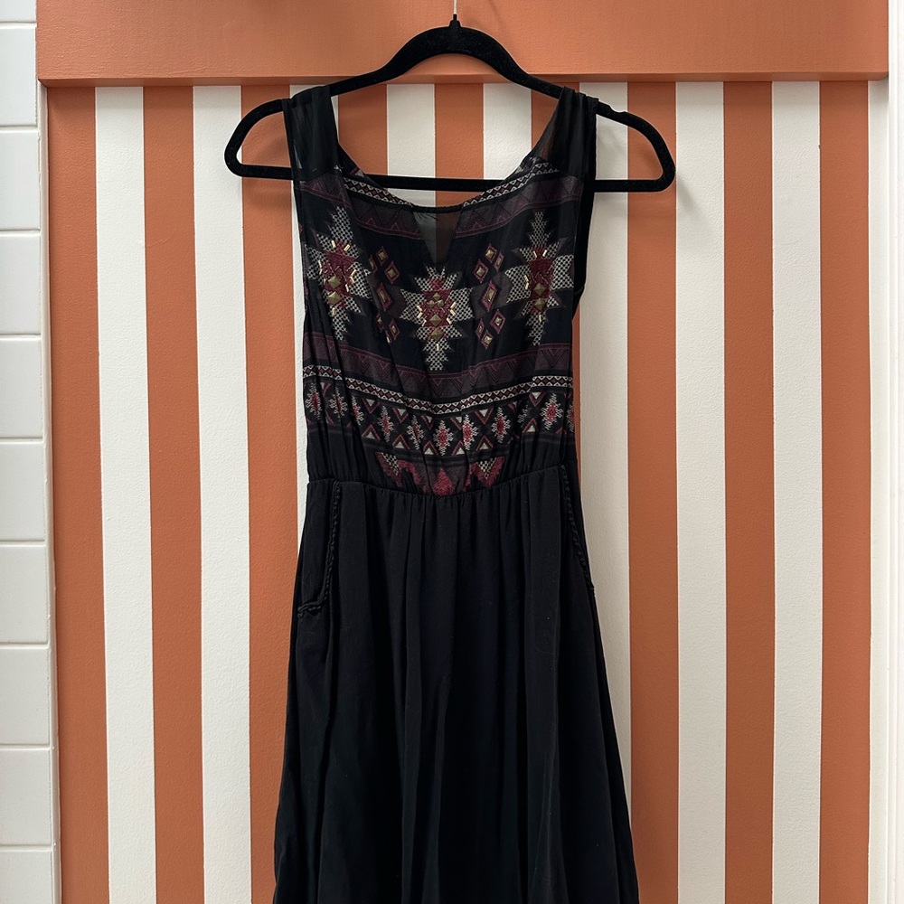 Black dress with ethnic pattern
